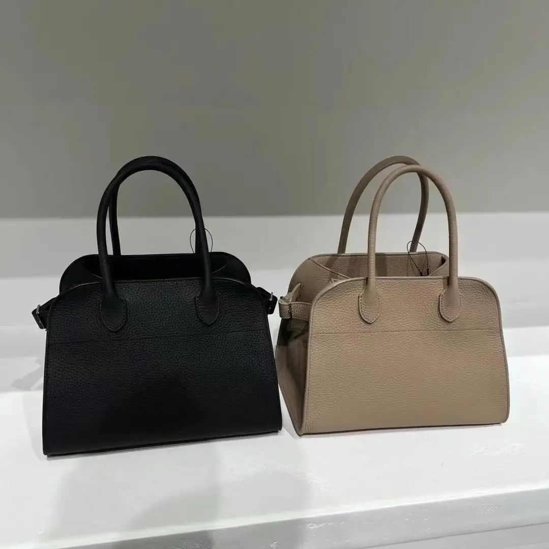 Simple and fashionable handbag leather crossbody women's bag small tote lunch box bag makeup bag cowhide layer
Simple and fashionable handbag leather crossbody women's bag small tote lunch box bag makeup bag cowhide layer