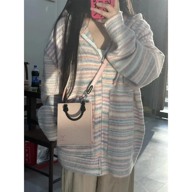 Hooded cardigan sweater coat women's spring and autumn winter new explosions lazy soft waxy loose top.
Hooded cardigan sweater coat women's spring and autumn winter new explosions lazy soft waxy loose top.