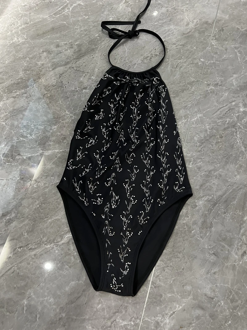 New women's triangle one-piece sexy backless diamond black beach holiday surf triangle one-piece swimsuit lace-up bikini style
New women's triangle one-piece sexy backless diamond black beach holiday surf triangle one-piece swimsuit lace-up bikini style