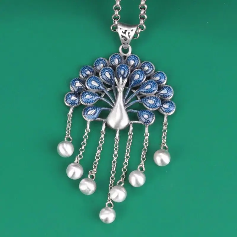 Dropping glue and oil process peacock tassel pendant with retro ethnic style pendant
Dropping glue and oil process peacock tassel pendant with retro ethnic style pendant