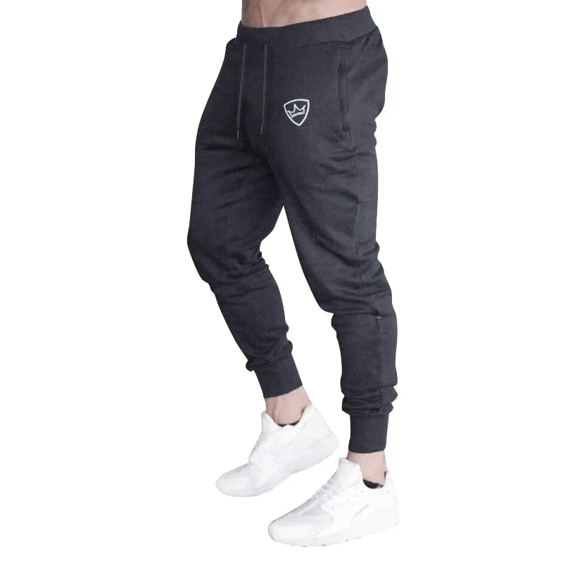

2024 высококачественные мужские модные повседневные однотонные облегающие спортивные брюки с принтом для бега эластичные удобные брюки с боковыми карманами