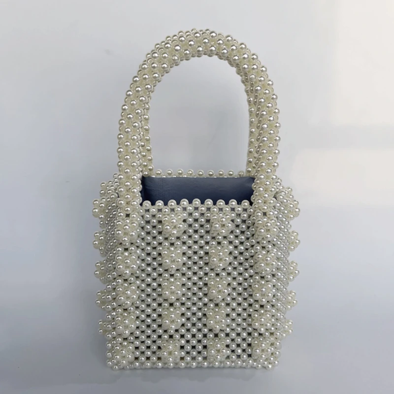 2022 Niche Women Boutique Fashion Pearl Handmade Protable Beaded Dinner Evening Bags Female Small Mini Square Handbag Box
2022 Niche Women Boutique Fashion Pearl Handmade Protable Beaded Dinner Evening Bags Female Small Mini Square Handbag Box
