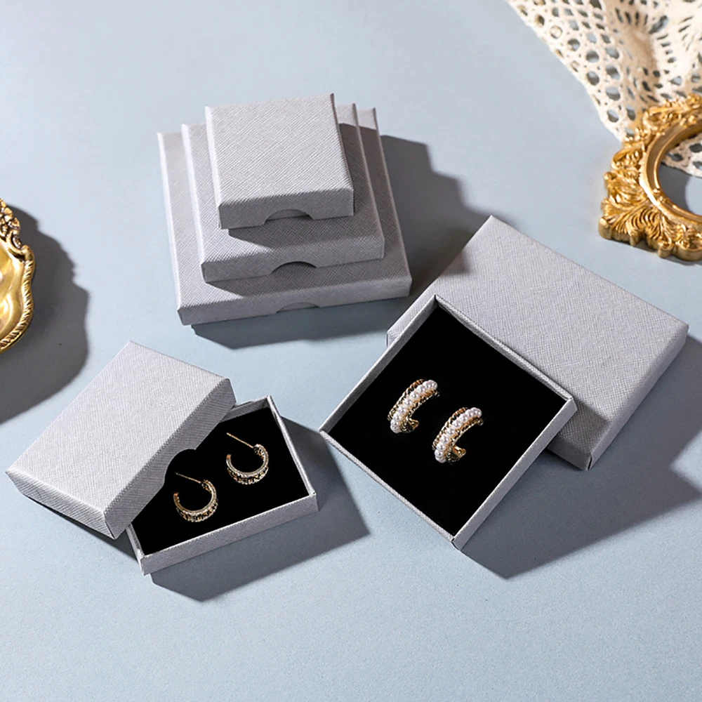 10pcs Grey Jewelry Organizer Box Thin Kraft Paper Carton 7x7x1.5cm 8x8x1.5cm Rings Earrings Necklace Packaging Storage Gift Case
10pcs Grey Jewelry Organizer Box Thin Kraft Paper Carton 7x7x1.5cm 8x8x1.5cm Rings Earrings Necklace Packaging Storage Gift Case