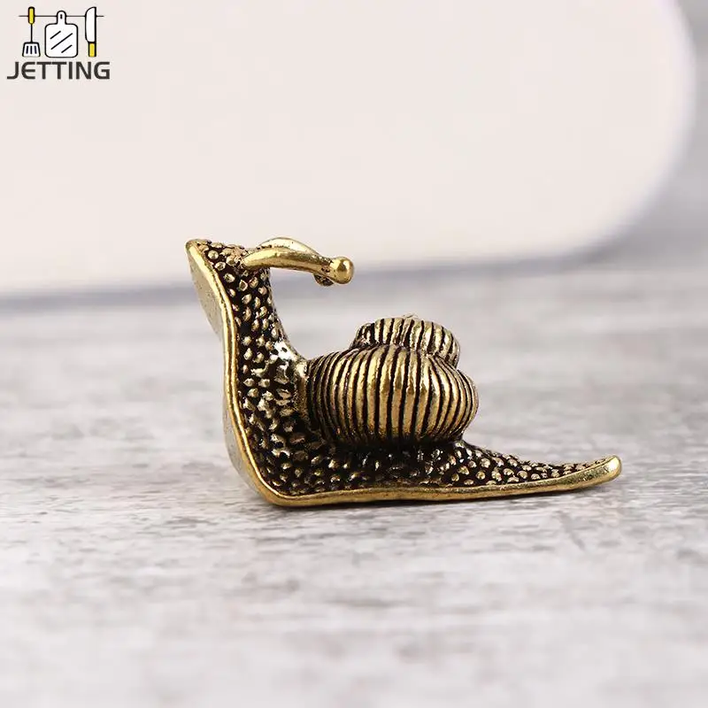 1Pc Personality Retro Brass Mini Snail Statue Ornaments Desk Antique Brass Tea Pet Collection Home Decorations For Living Room
1Pc Personality Retro Brass Mini Snail Statue Ornaments Desk Antique Brass Tea Pet Collection Home Decorations For Living Room