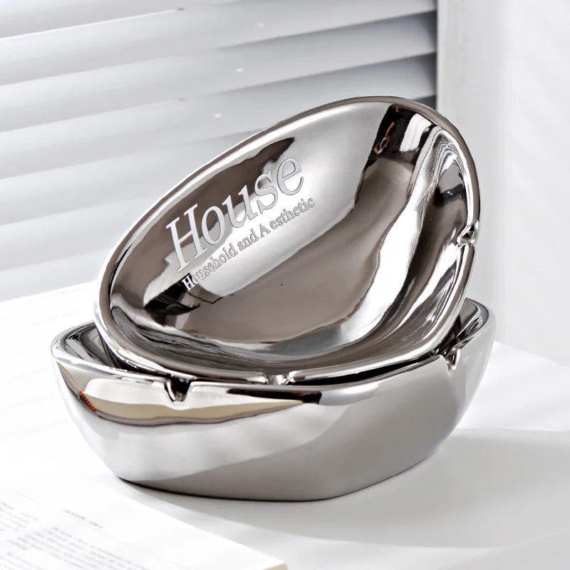 Irregular Triangle Shaped Silver Ash Tray Home Decoration Accessories Modern Living Room Table Ornaments Ceramic Ashtray Crafts
Irregular Triangle Shaped Silver Ash Tray Home Decoration Accessories Modern Living Room Table Ornaments Ceramic Ashtray Crafts
