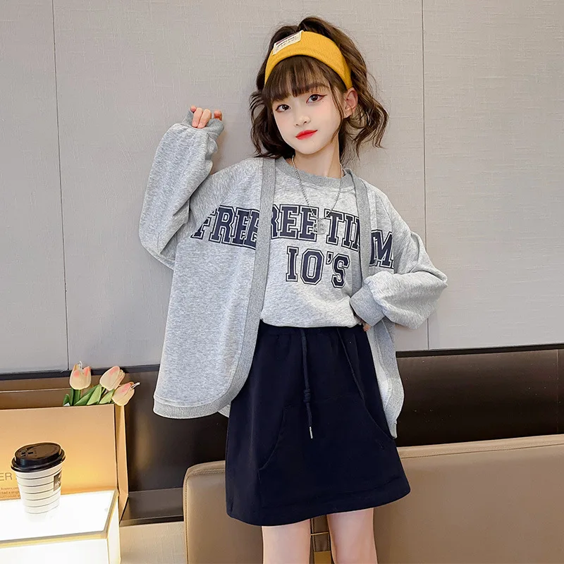 Korean Spring Autumn Junior Girl 3-Piece Sets Children Girl Short Sleeve Top+Letter Printed Cardigan+Skirt Set For Girls 4-12Yrs
Korean Spring Autumn Junior Girl 3-Piece Sets Children Girl Short Sleeve Top+Letter Printed Cardigan+Skirt Set For Girls 4-12Yrs