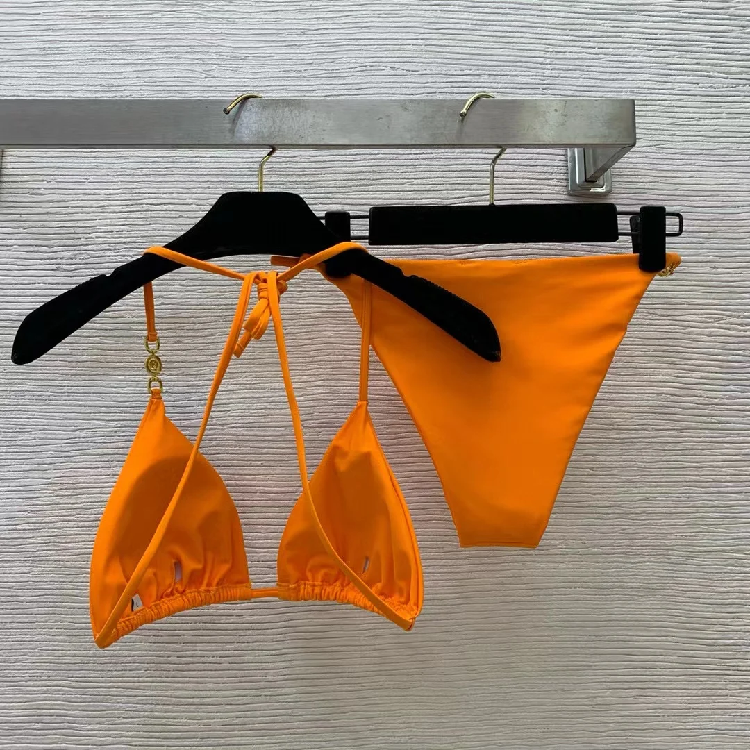 

New sexy bikini split swimsuit! Simple solid color halter neck suspender underwear + thong briefs suit, a must-have for seaside