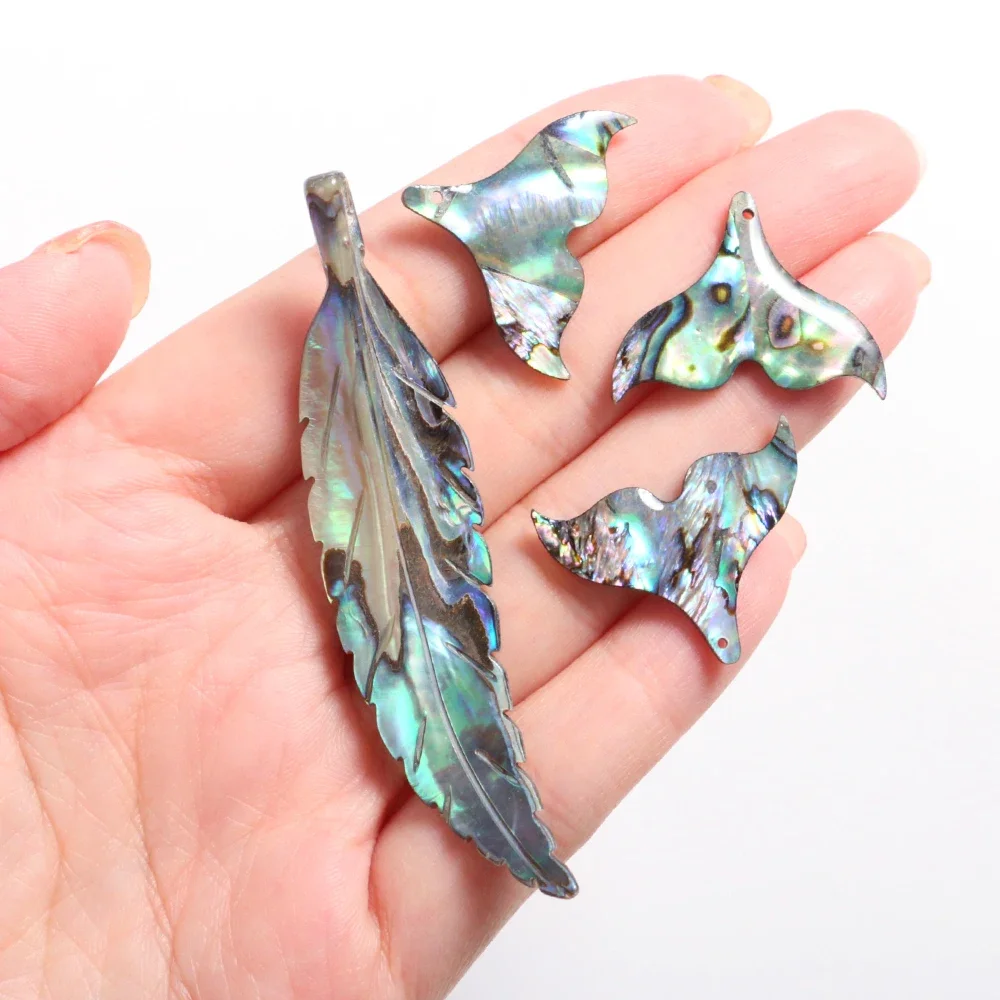 Mineraali Mini Natural Abalone Shell Beads Fish Tail Shape Pendant Hanging Stone with Hole Ornament for DIY Making Charm Earring
Mineraali Mini Natural Abalone Shell Beads Fish Tail Shape Pendant Hanging Stone with Hole Ornament for DIY Making Charm Earring