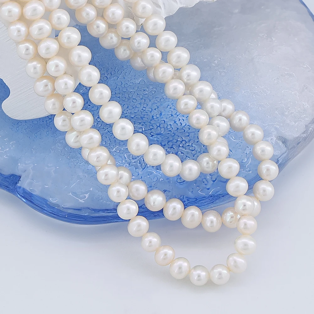 Натуральный пресноводный круглый жемчуг, 5-6 мм 
Натуральный пресноводный круглый жемчуг, 5-6 мм