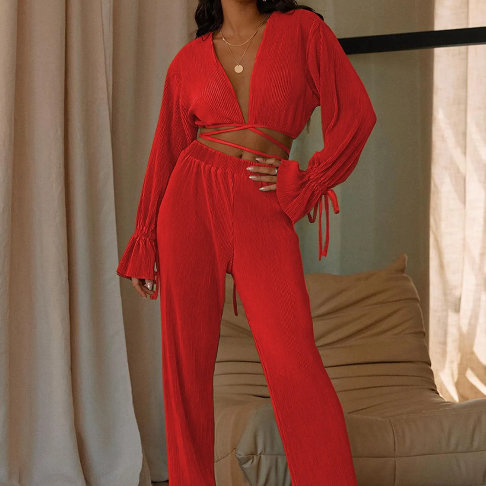 Ladies Sexy V Neck Fashion Crossover Strap Waistless Long Sleeve Lace Cuffs Tops And Solid Color High Waist Straight Pants Suit 
Ladies Sexy V Neck Fashion Crossover Strap Waistless Long Sleeve Lace Cuffs Tops And Solid Color High Waist Straight Pants Suit