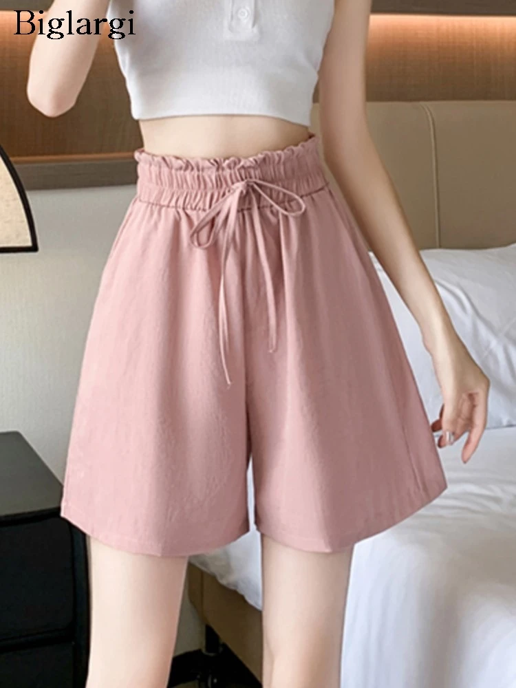 Летние эластичные Мини-шорты с высокой талией, женские свободные повседневные брюки с широкими штанинами в Корейском стиле, модные женские шорты с широкими штанинами
Летние эластичные Мини-шорты с высокой талией, женские свободные повседневные брюки с широкими штанинами в Корейском стиле, модные женские шорты с широкими штанинами