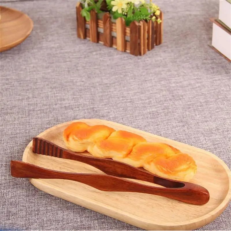 Bamboo Cooking Kitchen Tongs Food BBQ Tool Salad Bacon Steak Bread Cake Wooden Clip Home Kitchen Utensil
Bamboo Cooking Kitchen Tongs Food BBQ Tool Salad Bacon Steak Bread Cake Wooden Clip Home Kitchen Utensil