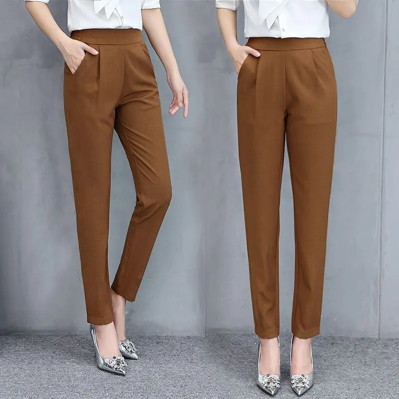 

New Spring and Summer Women's Solid Color Mid Waist Elastic Loose Harem Pants Pockets Fashion Casual Commuter Trousers