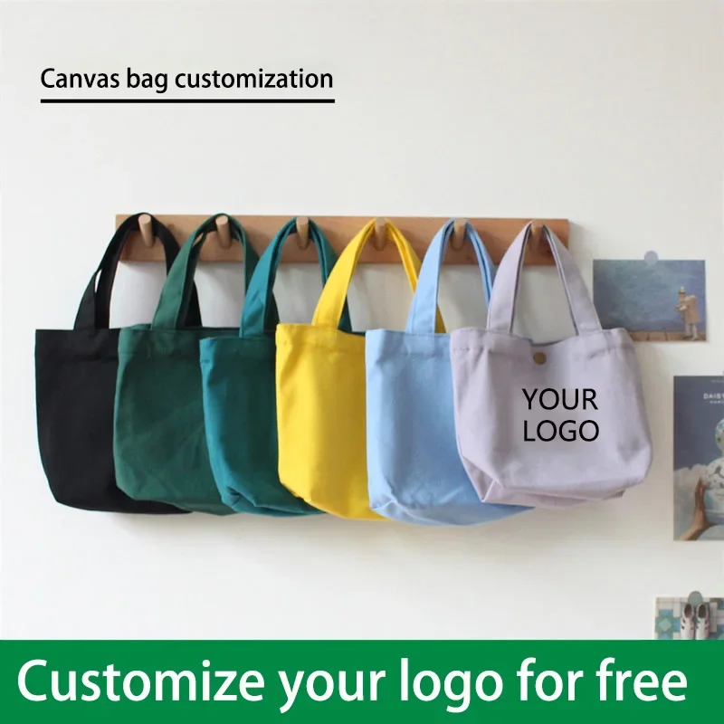 Customized logo, simple and solid color small canvas women's bag, portable lunch box, storage, makeup bag, ins sail bag
Customized logo, simple and solid color small canvas women's bag, portable lunch box, storage, makeup bag, ins sail bag