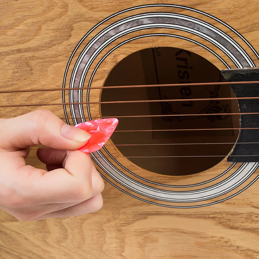 12Pcs 0.46mm Guitar Picks Plectrum Celluloid Acoustic Electric Guitar Bass Music Instruments Accessories Mix Color
12Pcs 0.46mm Guitar Picks Plectrum Celluloid Acoustic Electric Guitar Bass Music Instruments Accessories Mix Color