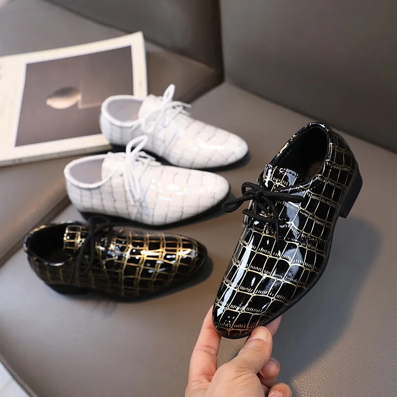 Pointed Lace Up Boys Leather Shoes British Style Black White Plaid Student School Performance Dance Leather Shoes Kids Moccasins
Pointed Lace Up Boys Leather Shoes British Style Black White Plaid Student School Performance Dance Leather Shoes Kids Moccasins