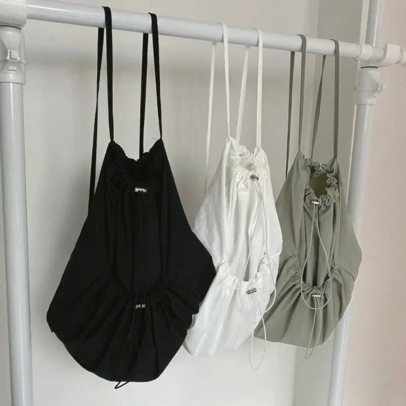 Korean Casual Nylon High-capacity Students Backpack Simple All Match Drawstring Pleated Schoolbags Women Vintage Solid Backpacks
Korean Casual Nylon High-capacity Students Backpack Simple All Match Drawstring Pleated Schoolbags Women Vintage Solid Backpacks