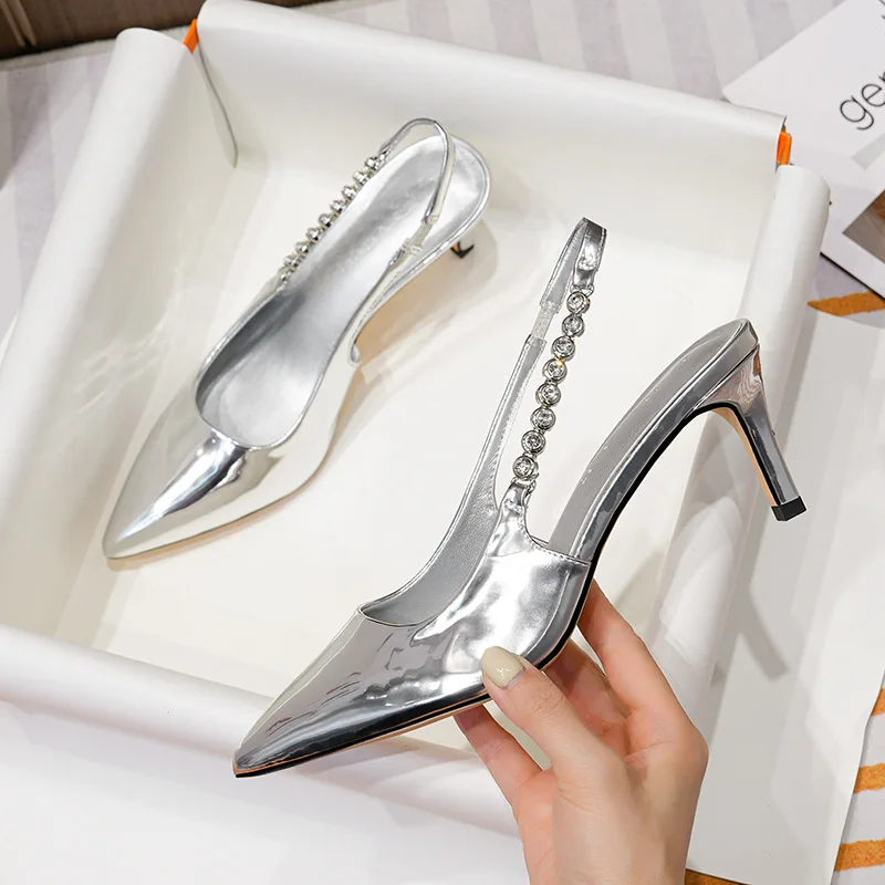 New Summer Women's High-heeled Shoes with Rhinestone Pointed Toe Silver Sequins Stiletto Heels with Back Empty Shoes
New Summer Women's High-heeled Shoes with Rhinestone Pointed Toe Silver Sequins Stiletto Heels with Back Empty Shoes