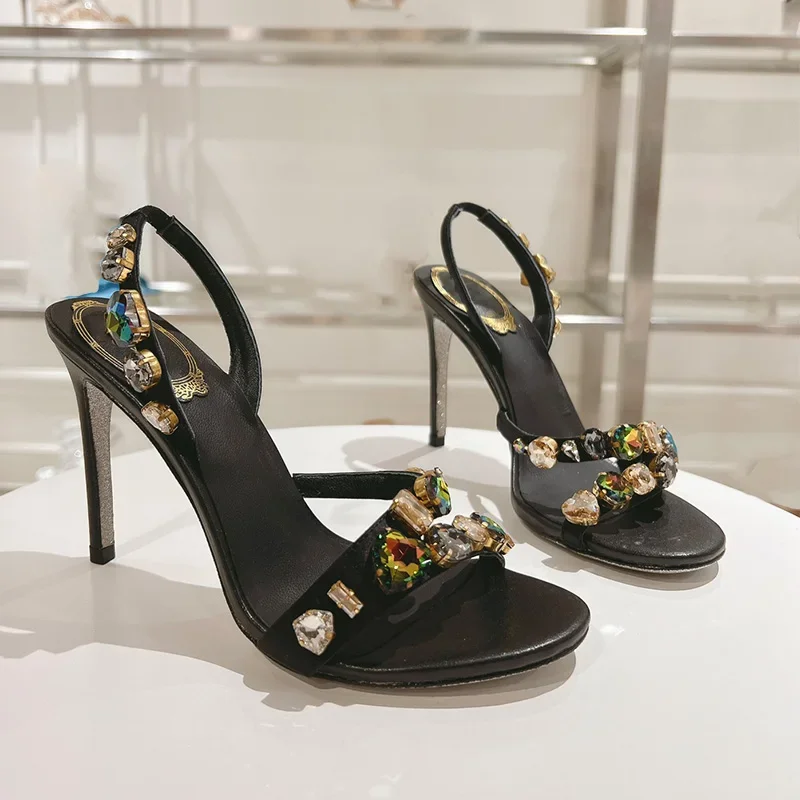 Блестящие сандалии на высоком каблуке с кристаллами, Женская Модная шелковая летняя кожаная Свадебная обувь, женские сандалии на тонком каблуке
Блестящие сандалии на высоком каблуке с кристаллами, Женская Модная шелковая летняя кожаная Свадебная обувь, женские сандалии на тонком каблуке