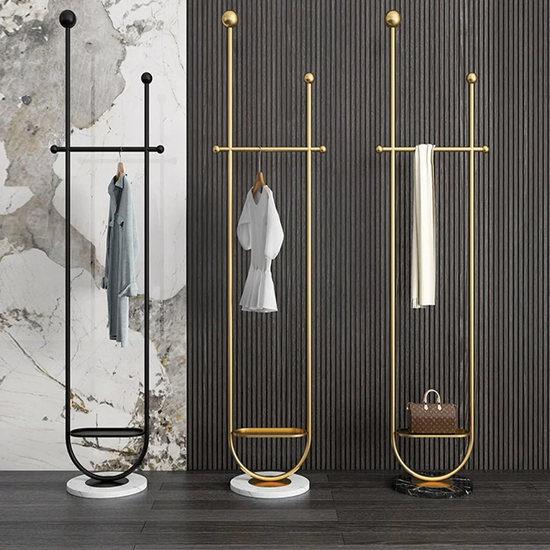 Light luxury U shaped gold coat rack floor to ceiling bedroom home hanging hanger living room hotel simple wrought iron hanger
Light luxury U shaped gold coat rack floor to ceiling bedroom home hanging hanger living room hotel simple wrought iron hanger