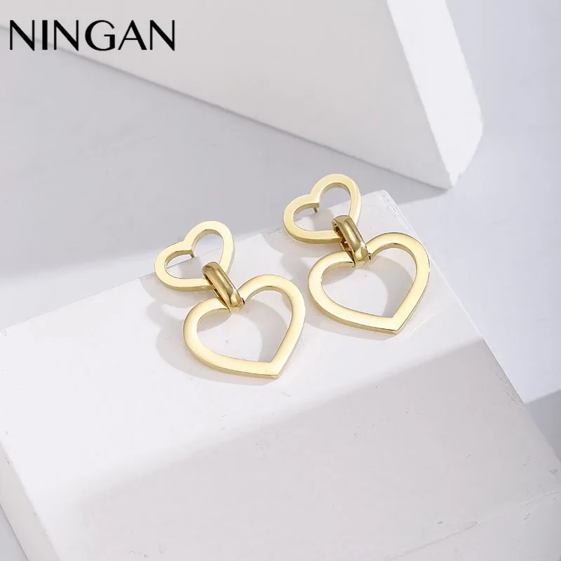 Серьги-гвоздики NINGAN в форме сердца золотого цвета, модные женские серьги-капли, простое Ювелирное Украшение для девочек вечерние Ринок и свадеб
Серьги-гвоздики NINGAN в форме сердца золотого цвета, модные женские серьги-капли, простое Ювелирное Украшение для девочек вечерние Ринок и свадеб