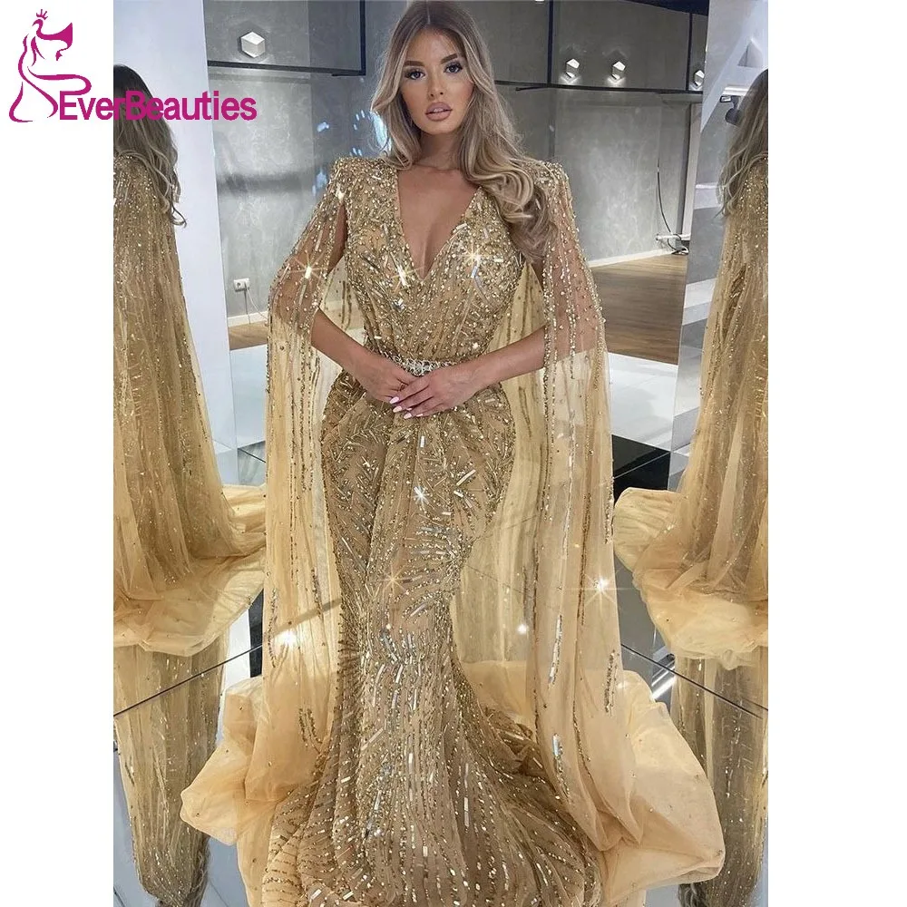Luxury Dubai Gold Mermaid Prom Dress with Cape Glitter Sequin V Neck Evening Dress Saudi Arabia Party Gown Formal Dress Long
Luxury Dubai Gold Mermaid Prom Dress with Cape Glitter Sequin V Neck Evening Dress Saudi Arabia Party Gown Formal Dress Long