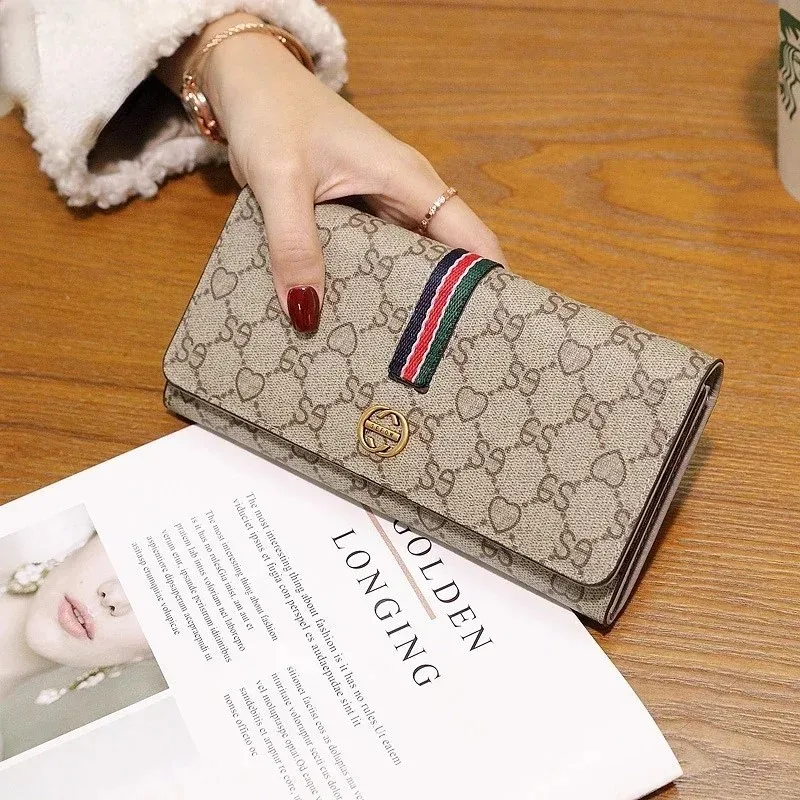 Luxury women's leather long wallet card bag all-in-one package 2024 new high-end multi-purpose leather wallet with large capacit
Luxury women's leather long wallet card bag all-in-one package 2024 new high-end multi-purpose leather wallet with large capacit