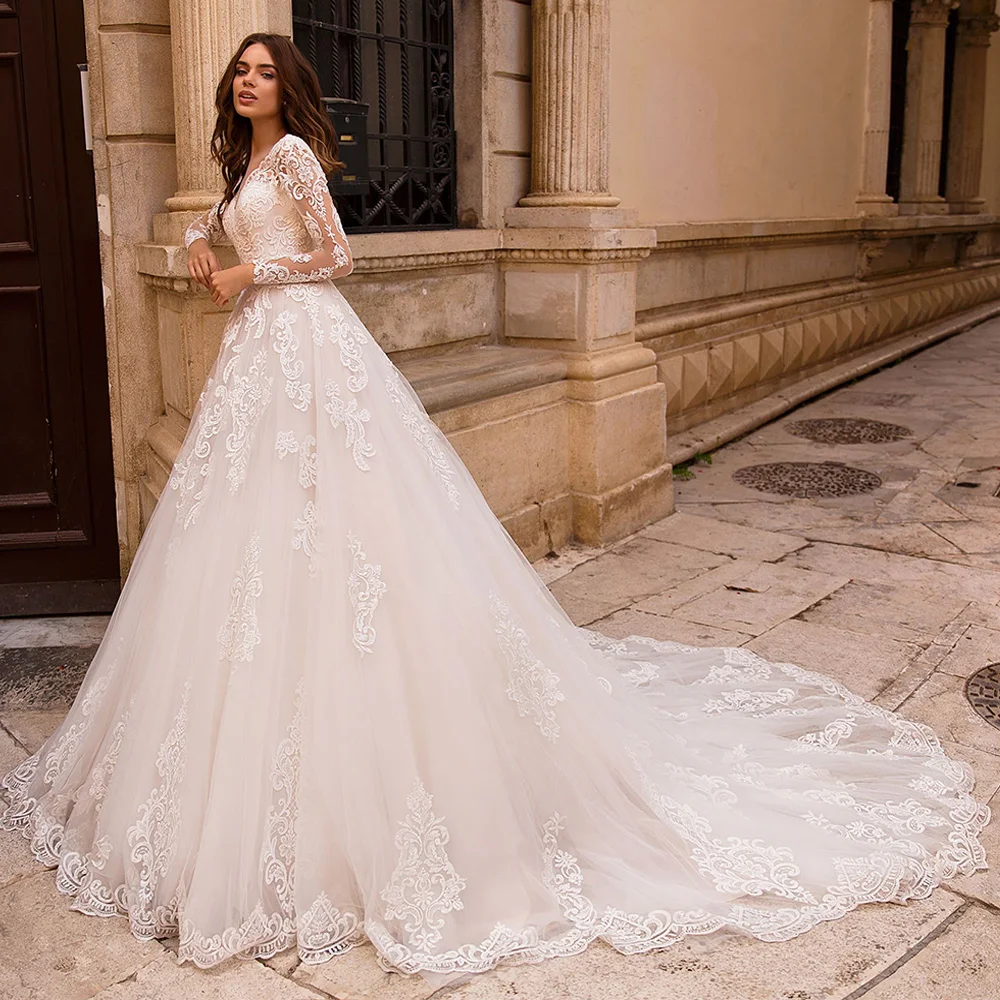 Exquisite Lace Wedding Dress Woman Long Sleeves V Neck Applique Sweep Train Vestido De Noiva Bridal Gown for Bride Lace-up
Exquisite Lace Wedding Dress Woman Long Sleeves V Neck Applique Sweep Train Vestido De Noiva Bridal Gown for Bride Lace-up