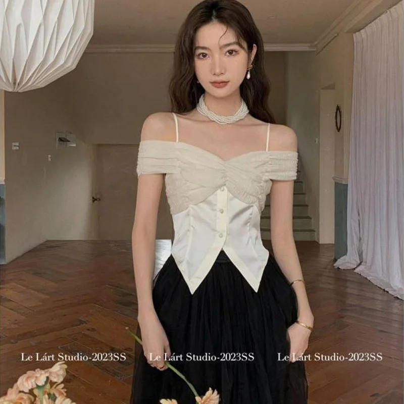Fashion Blouses 2023 Summer New Korean Version Design Splicing Strap Shirt Elegant Temperament Sling Vest Off-shoulder T-shirt
Fashion Blouses 2023 Summer New Korean Version Design Splicing Strap Shirt Elegant Temperament Sling Vest Off-shoulder T-shirt