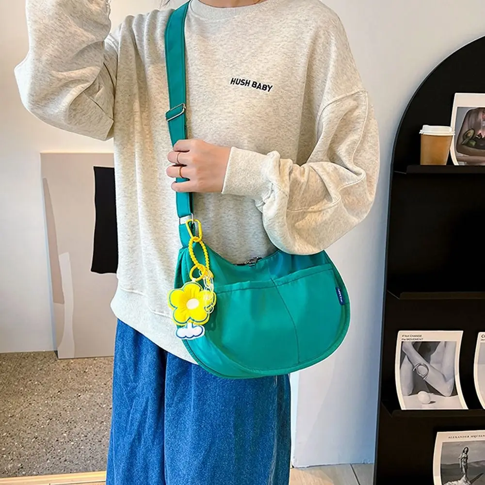 Simple Handbag With Pendant Solid Color Japanese Shoulder Pouch Canvas Bag Single Shoulder Bag Crossbody Bag Messenger Bag
Simple Handbag With Pendant Solid Color Japanese Shoulder Pouch Canvas Bag Single Shoulder Bag Crossbody Bag Messenger Bag