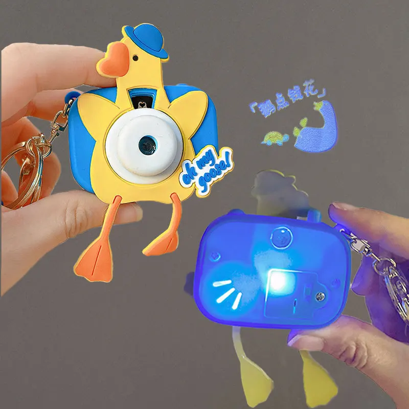Cartoon Cute 3d Three-dimensional Duck Projection Camera Keychain Pendant Kids Light-emitting Toy Creative Projection Camera Toy
Cartoon Cute 3d Three-dimensional Duck Projection Camera Keychain Pendant Kids Light-emitting Toy Creative Projection Camera Toy
