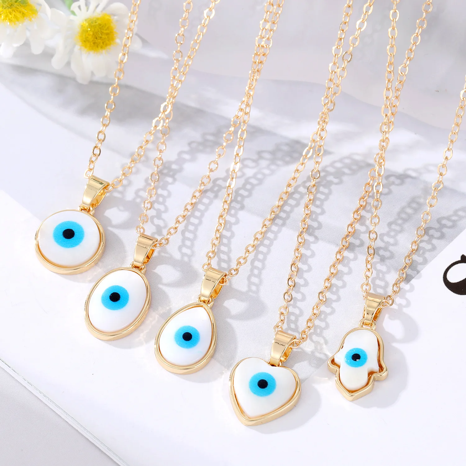 Evil EyeResin Water Drop Heart Hamsa Hand Pendant Necklaces For Women Turkish Blue Eye Choker Necklace Party Jewelry
Evil EyeResin Water Drop Heart Hamsa Hand Pendant Necklaces For Women Turkish Blue Eye Choker Necklace Party Jewelry