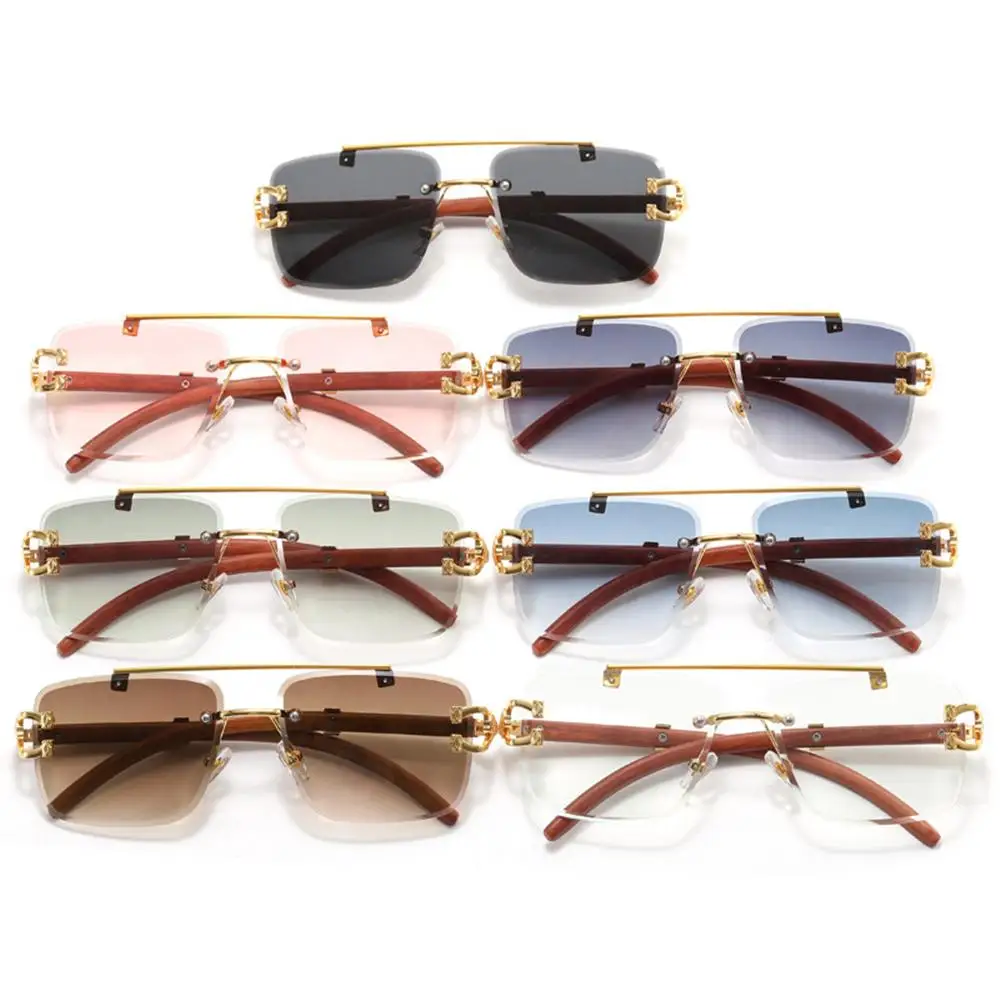 New Fashion UV Protection Gold Lion Decoration Rimless Glasses Sun Glasses Square Sunglasses Metal & Wood Eyeglasses
New Fashion UV Protection Gold Lion Decoration Rimless Glasses Sun Glasses Square Sunglasses Metal & Wood Eyeglasses