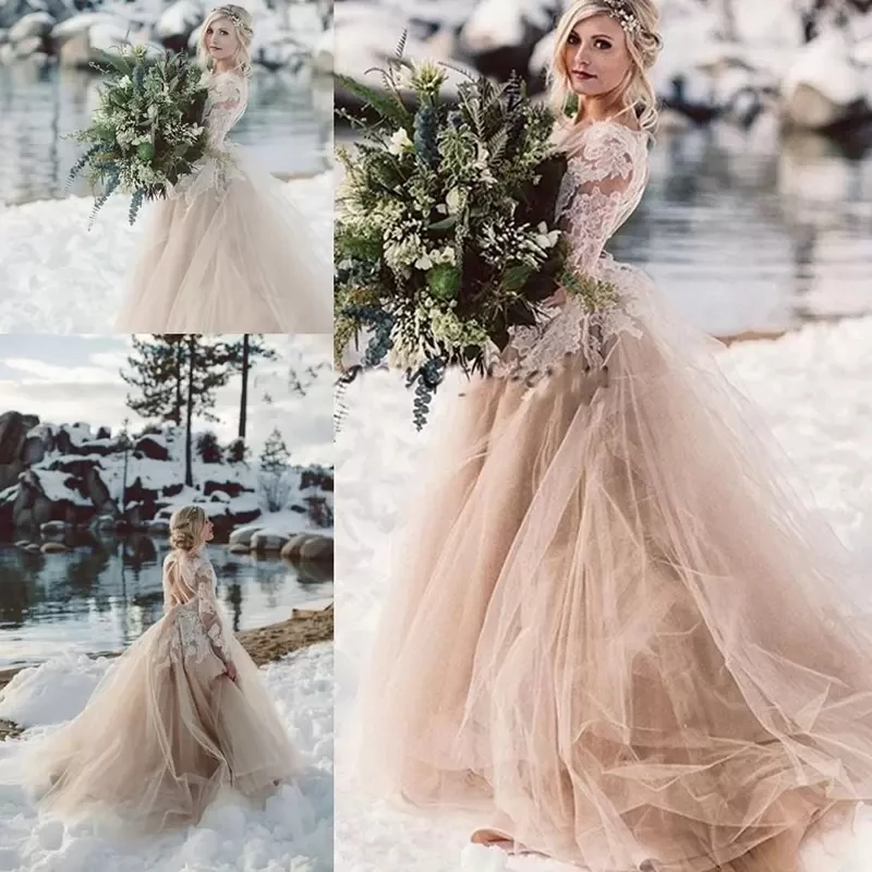 Champagne Beach Wedding Dress Crew Neck Backless Lace Applique Long Sleeves A Line Tulle Bridal Gowns 2023 Vintage Bride Dresses
Champagne Beach Wedding Dress Crew Neck Backless Lace Applique Long Sleeves A Line Tulle Bridal Gowns 2023 Vintage Bride Dresses