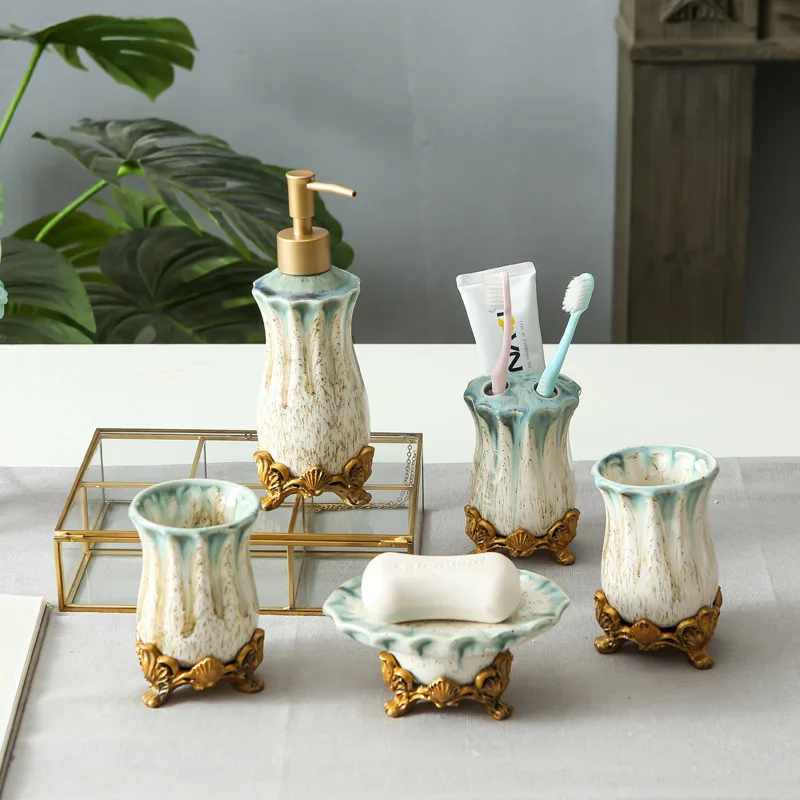 European Ceramics Five Piece Set Washing Tools Home Soap Dispenser Toothbrush Holder Tooth Mug Soap Dish Bathroom Toiletry Set
European Ceramics Five Piece Set Washing Tools Home Soap Dispenser Toothbrush Holder Tooth Mug Soap Dish Bathroom Toiletry Set