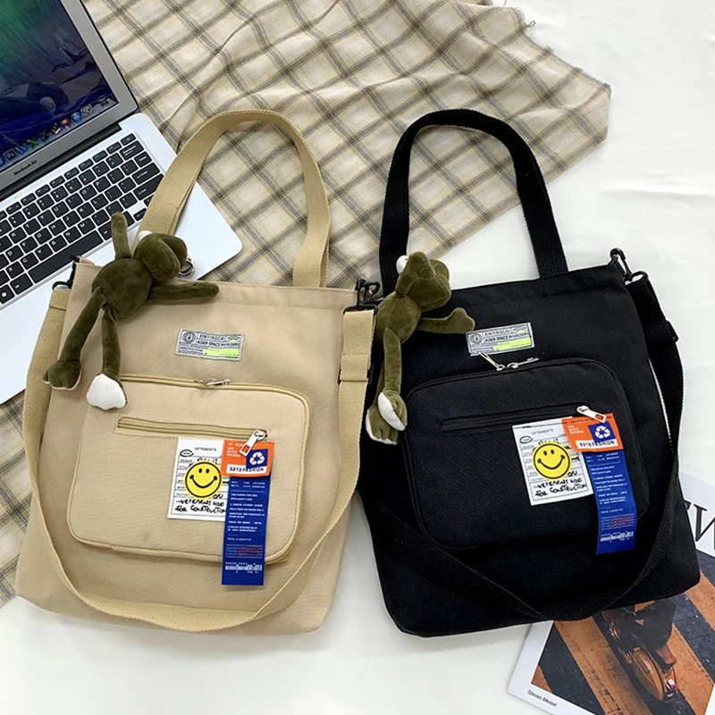 Casual Men Messenger Bags Korean Version Fashion Women Shoulder Bags Large Capacity Cartoon Canvas Handbags Student Book Bags
Casual Men Messenger Bags Korean Version Fashion Women Shoulder Bags Large Capacity Cartoon Canvas Handbags Student Book Bags