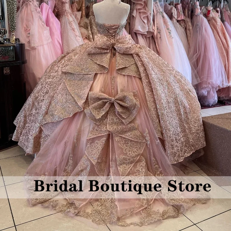 

Sparkly Rose Gold Sweetheart Quinceanera Dresses With Bows Ball Gown Glitter Appliques Crystals Beads Sweet 15th Dress Prom