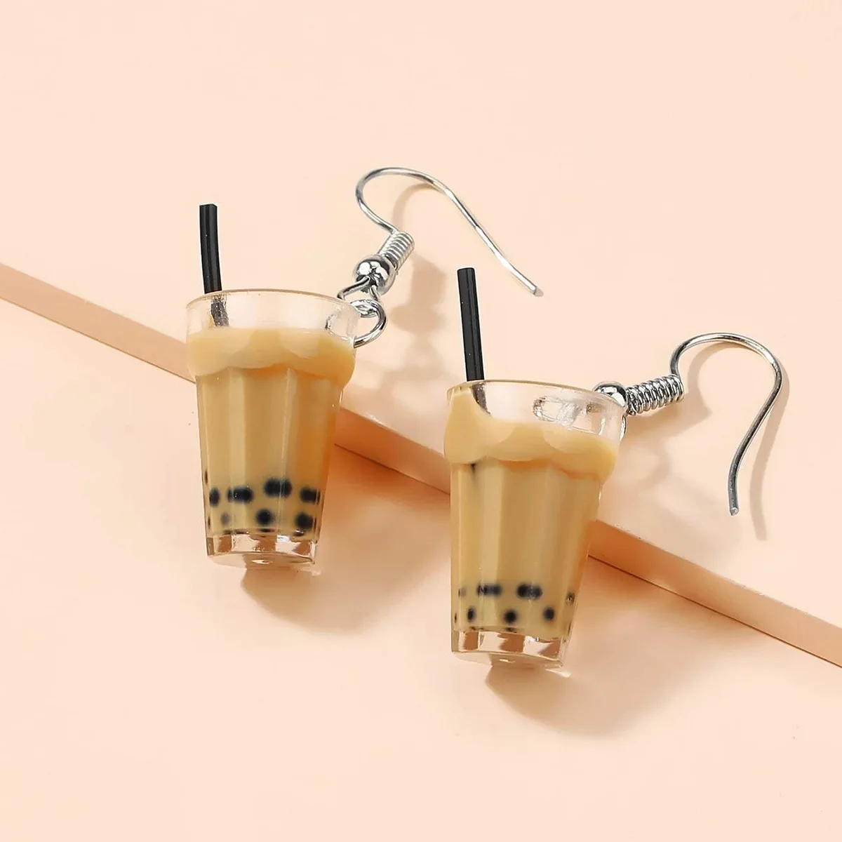 Lovely fashion pearl milk tea drink mini milk tea student girl jewelry earring gift
Lovely fashion pearl milk tea drink mini milk tea student girl jewelry earring gift