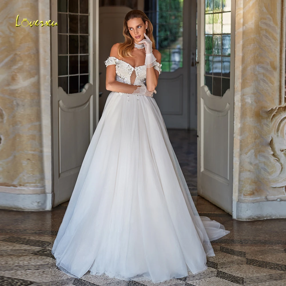Женское свадебное платье Loverxu, ТРАПЕЦИЕВИДНОЕ кружевное платье с открытыми плечами и 3D цветами, 2024
Женское свадебное платье Loverxu, ТРАПЕЦИЕВИДНОЕ кружевное платье с открытыми плечами и 3D цветами, 2024
