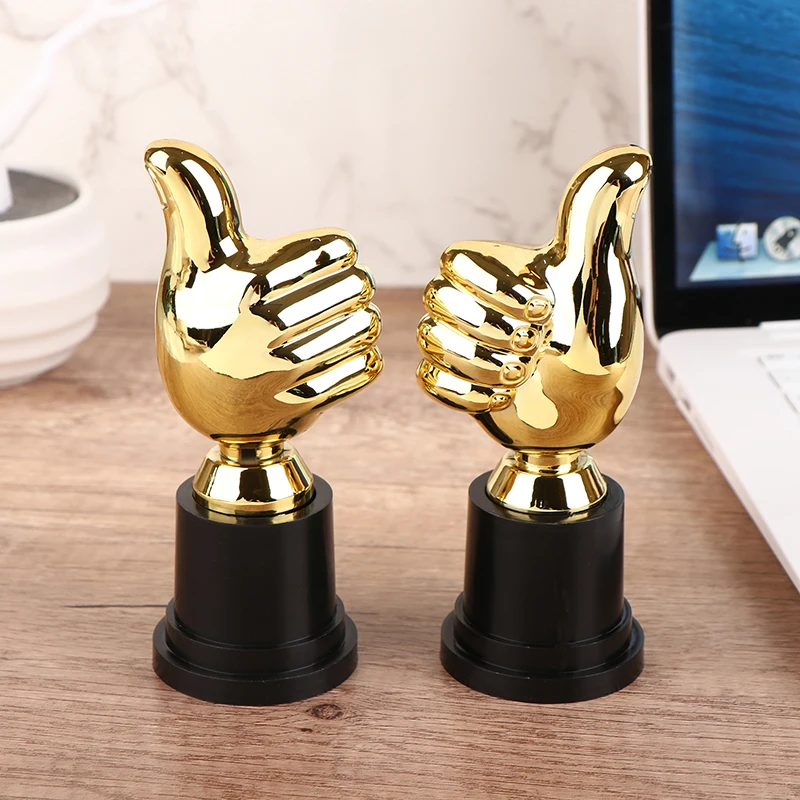 1Pcs Mini Awards Trophies Reward Thumbs Trophy Toys Kids Competition Winner Prize For Children Party Favors
1Pcs Mini Awards Trophies Reward Thumbs Trophy Toys Kids Competition Winner Prize For Children Party Favors