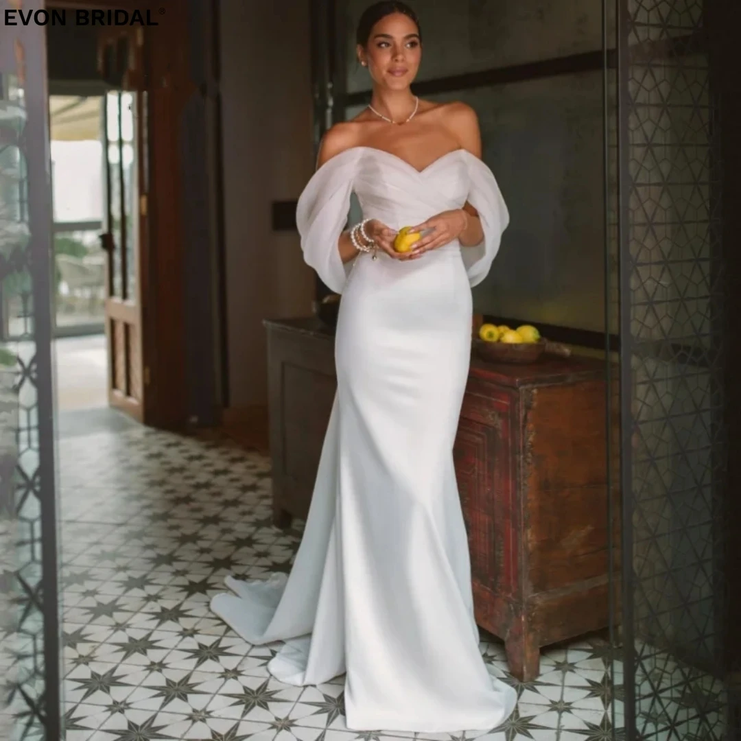 EVON BRIDAL Stain Sweetheart Tulle White Wedding Dresses for Women 2024 Off the Shoulder Backless Sexy Mermaid Pleat Prom Dress
EVON BRIDAL Stain Sweetheart Tulle White Wedding Dresses for Women 2024 Off the Shoulder Backless Sexy Mermaid Pleat Prom Dress