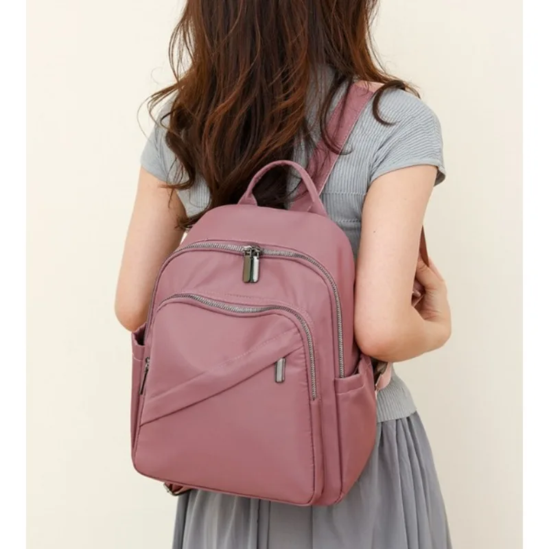 Korean Version The New Fashion Oxford Cloth Backpack Women's Lightweight Waterproof Backpack Nylon Storage Crossbody Travel Bag
Korean Version The New Fashion Oxford Cloth Backpack Women's Lightweight Waterproof Backpack Nylon Storage Crossbody Travel Bag