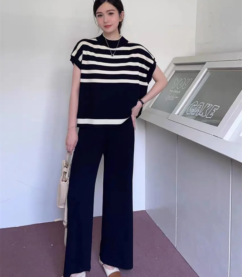 New Spring Summer Knitted Two Piece Set Fashion Women Stand Collar Striped Loose Sweaters + Elastic Waist Wide Leg Pants Suits 
New Spring Summer Knitted Two Piece Set Fashion Women Stand Collar Striped Loose Sweaters + Elastic Waist Wide Leg Pants Suits