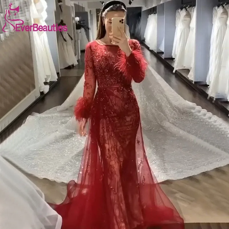Luxury Beaded Dubai Prom Dresses Long Sleeves Saudi Arabia Evening Dress Burgundy Prom Gowns Mermaid Formal Dress with Feathers
Luxury Beaded Dubai Prom Dresses Long Sleeves Saudi Arabia Evening Dress Burgundy Prom Gowns Mermaid Formal Dress with Feathers