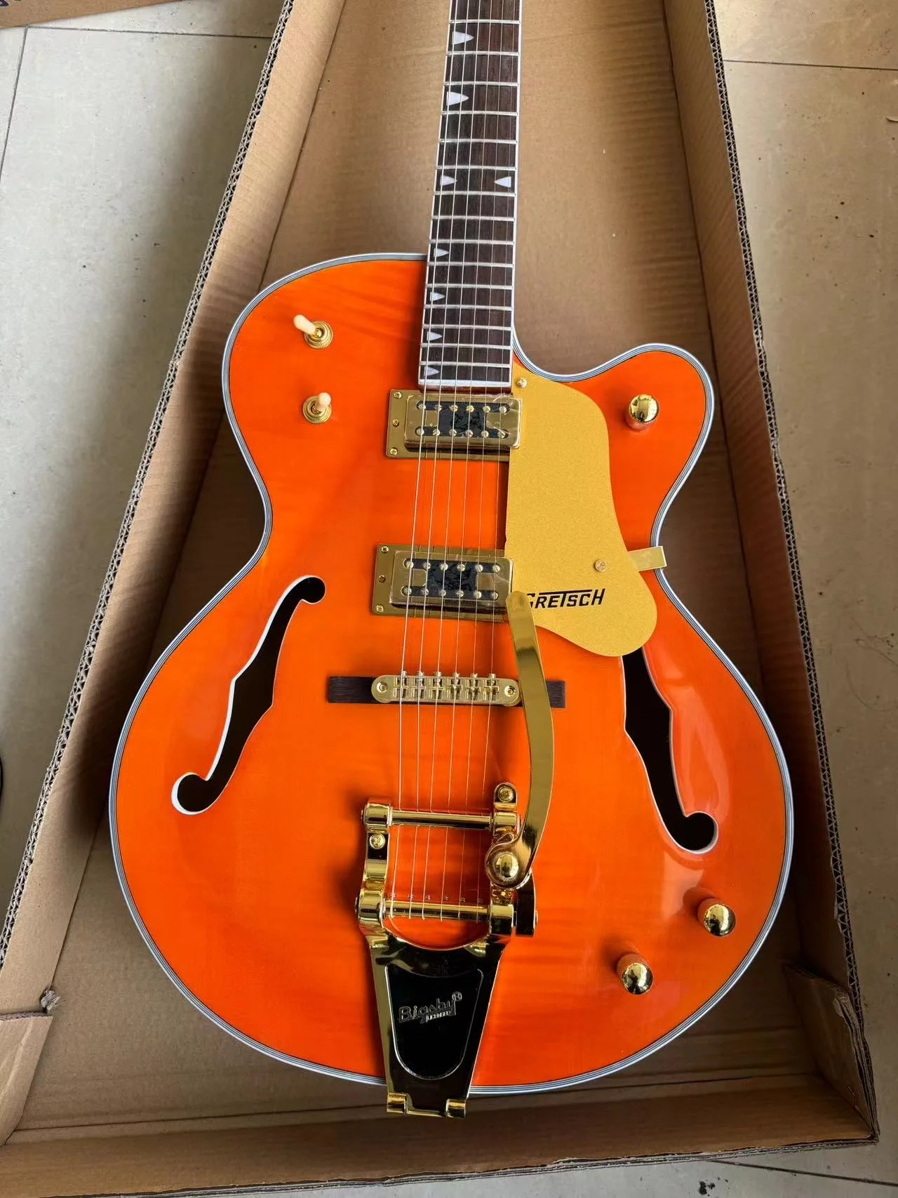 Orange Jazz 6 Strings F Hole Electric Guitar Semi-Hollow Body Gold Hardware Big Tremolo Glossy Finish Free Delivery
Orange Jazz 6 Strings F Hole Electric Guitar Semi-Hollow Body Gold Hardware Big Tremolo Glossy Finish Free Delivery