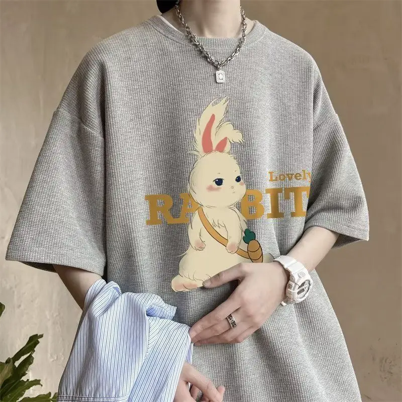 Summer men and women loose fitting personalized rabbit print graphic T-shirt couple hip-hop trend round neck short sleeved top
Summer men and women loose fitting personalized rabbit print graphic T-shirt couple hip-hop trend round neck short sleeved top