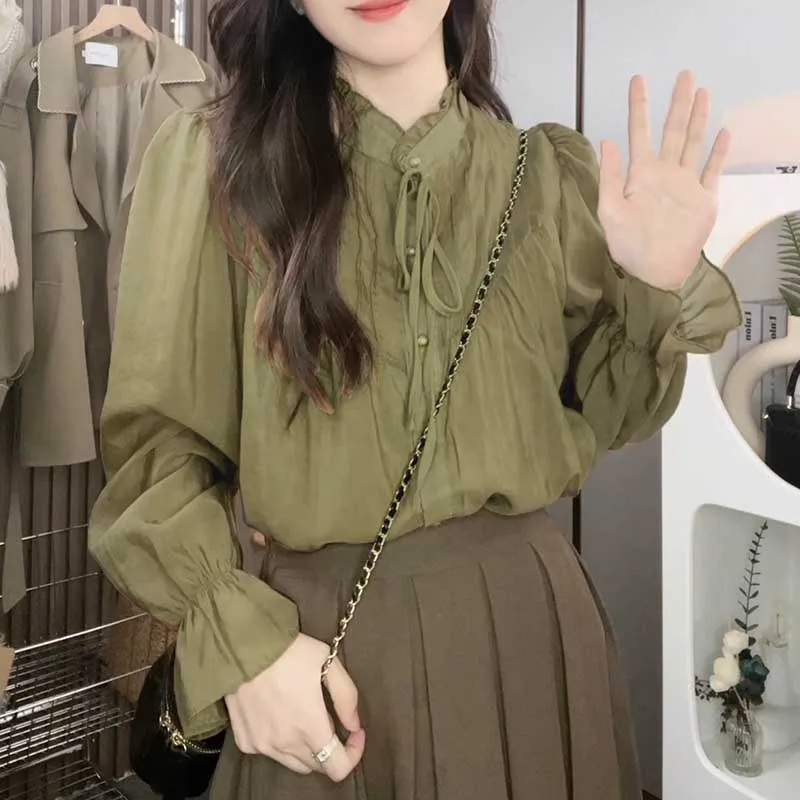 Elegant Ruffled Neck Lace Up Flare Sleeve Shirts Women Clothing 2023 Autumn Winter Loose All-match Tops Office Lady Blouses
Elegant Ruffled Neck Lace Up Flare Sleeve Shirts Women Clothing 2023 Autumn Winter Loose All-match Tops Office Lady Blouses
