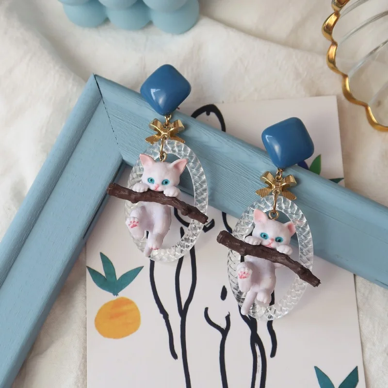 New original Baochai (money) cat Sen hair ball branch cat girl heart East students female Kitty Cat cartoon Earrings Jewelry
New original Baochai (money) cat Sen hair ball branch cat girl heart East students female Kitty Cat cartoon Earrings Jewelry