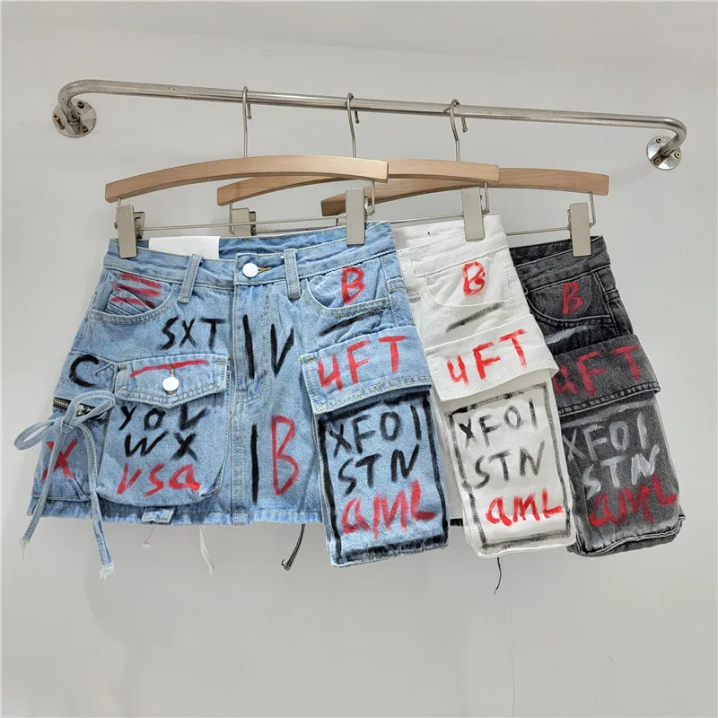 

Hand-painted Graffiti Pocket Design Feeling Denim Skirt Women 2024 Summer New Workwear Splicing A-line Short Skirt LX037