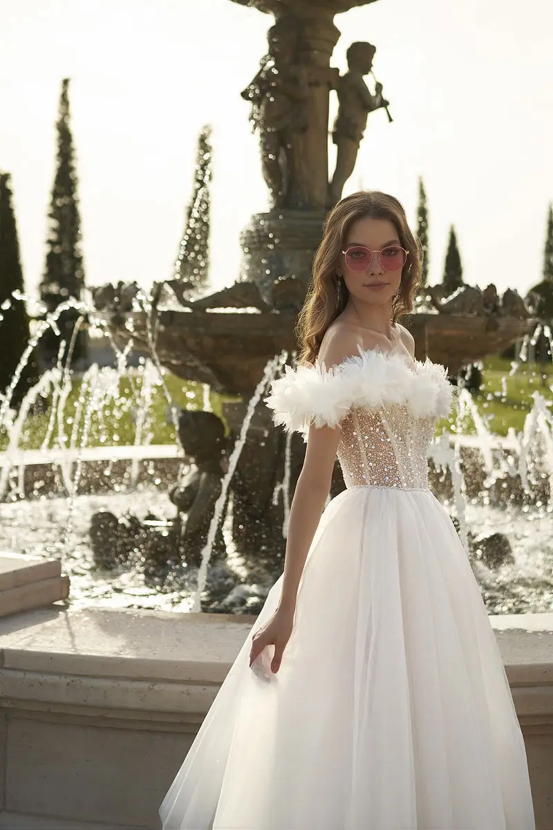 Изящные свадебные платья с оборками и открытыми плечами, блестящий топ с блестками, трапециевидная юбка, длина в пол, Vestidos De Boda 2023 
Изящные свадебные платья с оборками и открытыми плечами, блестящий топ с блестками, трапециевидная юбка, длина в пол, Vestidos De Boda 2023